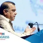 FIH President Dr Narinder Dhruv Batra addressing the guests at the FIH Honorary Awards ceremony in New Delhi. Credit: Hockey India
