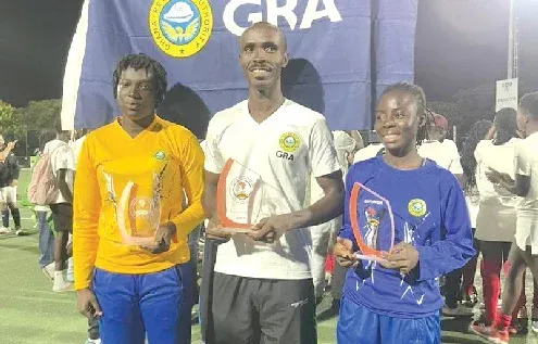 From Left: GRA Women's goalkeeper Matilda Addison, men's shot-stopper Eugene Achemapong, and skipper Elizabeth Opoku, display their individual awards